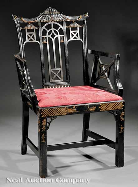 Appraisal: A Chinese Chippendale-Style Ebonized and Parcel Gilt Armchair the reticulated