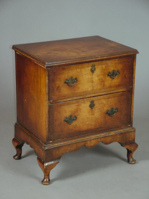 Appraisal: A walnut chest of two drawers circa of two graduated