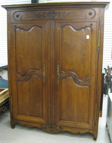 Appraisal: PROVINCIAL STYLE OAK ARMOIRE French mid th century having a