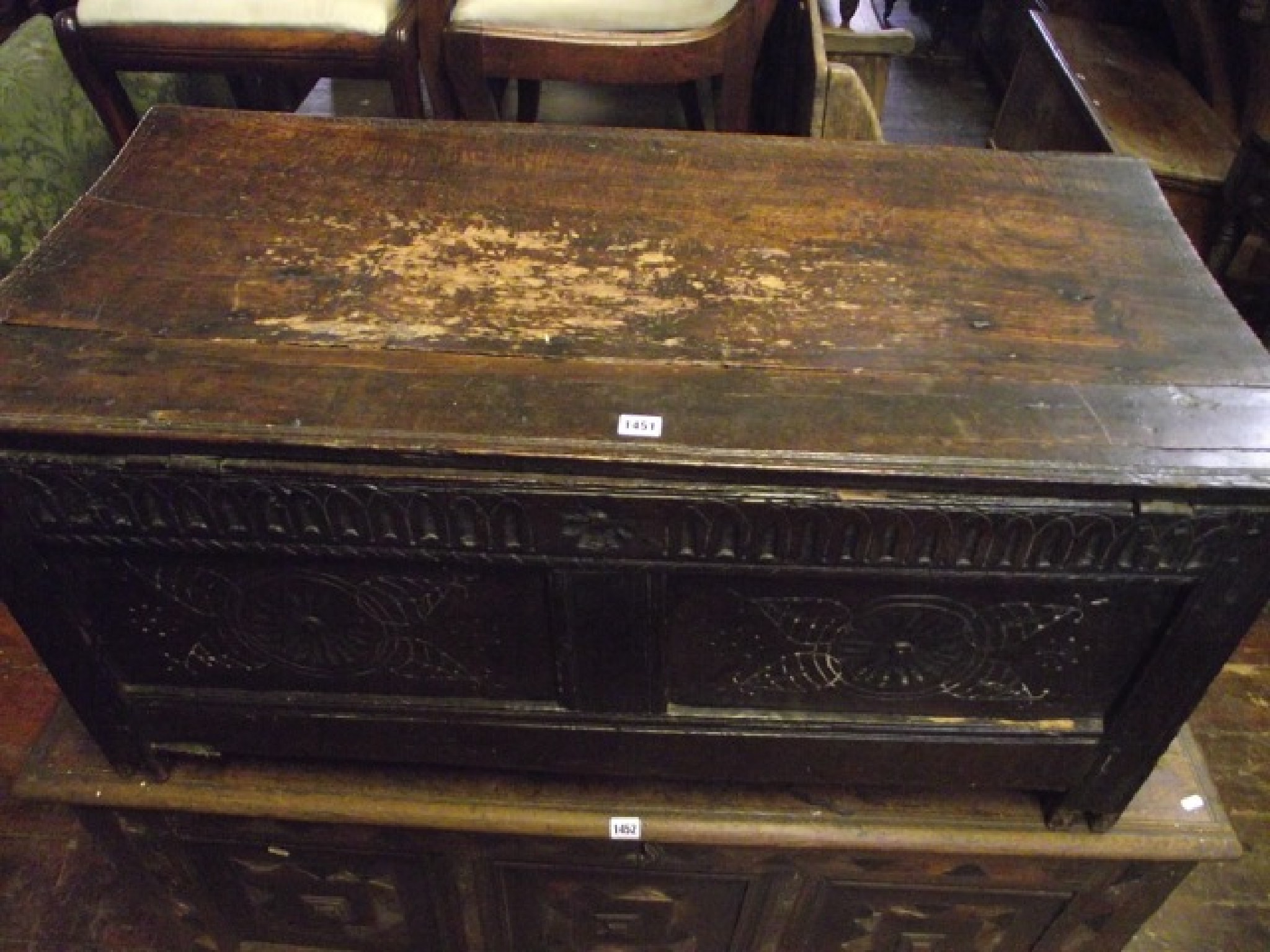 Appraisal: An th century oak coffer with plank lid over a