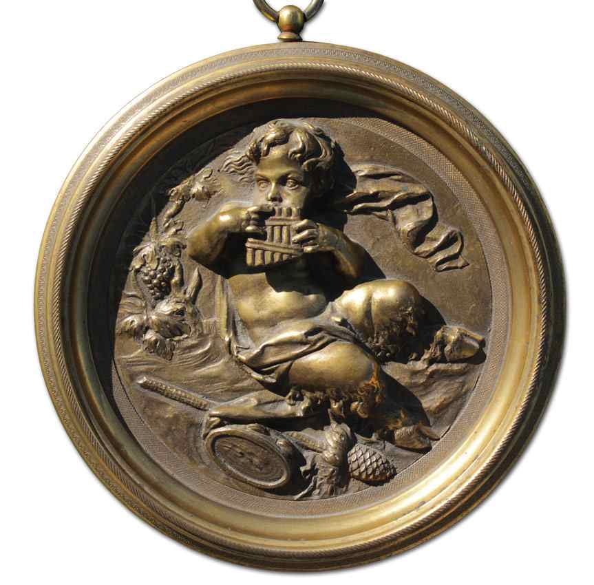 Appraisal: BRONZE RELIEF SCULPTURE PLAQUE OF PAN '' diameter backfilled with