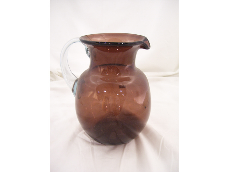 Appraisal: Plum Glass Water Pitcher Hand blown pitcher with pontil mark