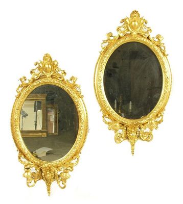 Appraisal: A pair of th century gilt wood and gesso girandoles