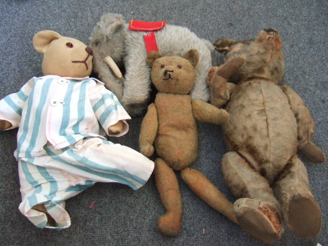 Appraisal: An early th century straw filled teddy bear cm a