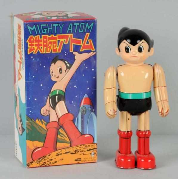 Appraisal: Tin Might Atom Boy Wind-Up Toy Description Japanese Made by