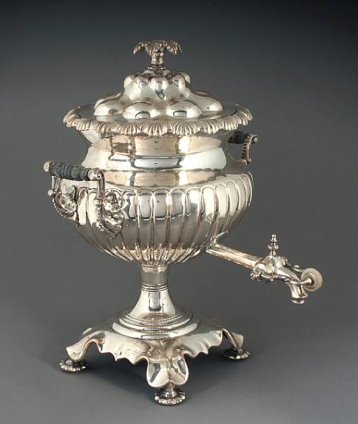 Appraisal: A silver plate hot water urn together with a silver