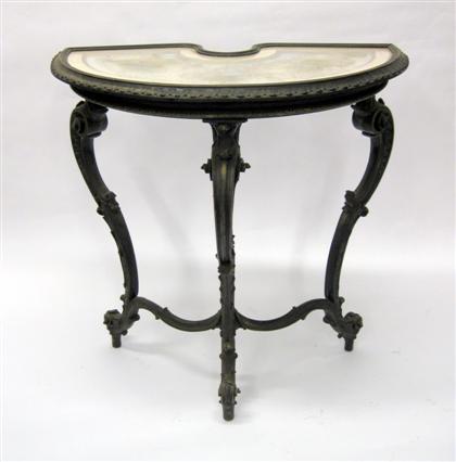 Appraisal: Louis XV style ebonized side tableThe demi-lune glazed top inset