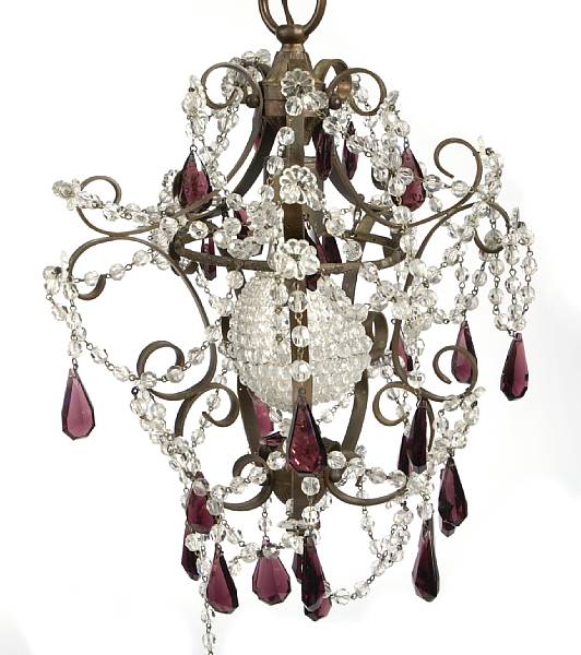 Appraisal: A near pair of patinated metal and cut glass chandeliers