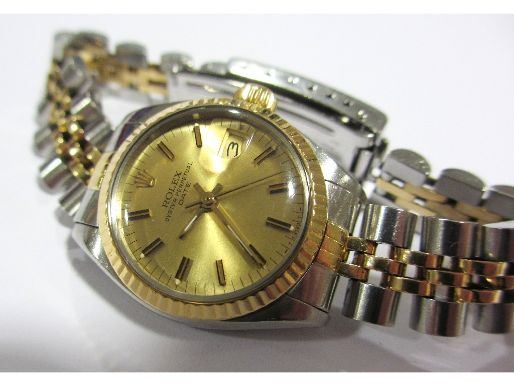 Appraisal: A ladies Rolex Oyster Perpetual Date wrist watch in gold