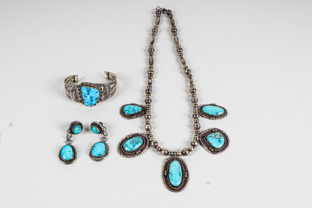 Appraisal: SILVER TURQUOISE JEWELRY SUITEcomprising a necklace cuff bracelet and pair