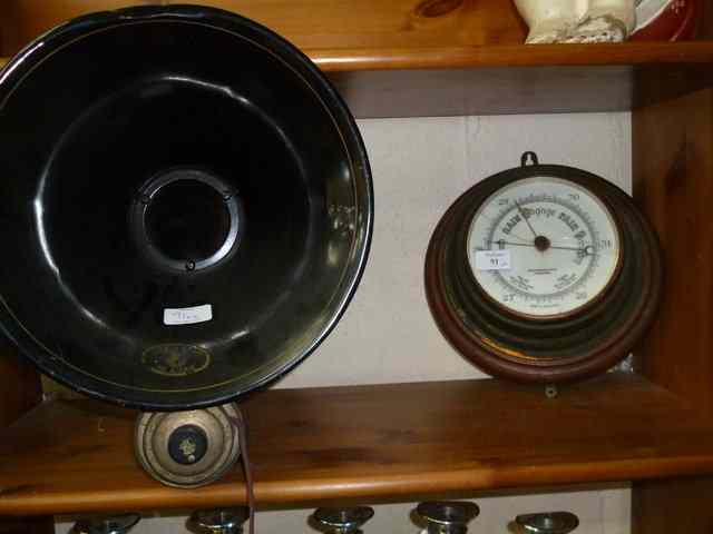 Appraisal: AN OLD WALL HANGING BRASSED CASED ANEROID BAROMETER the dial