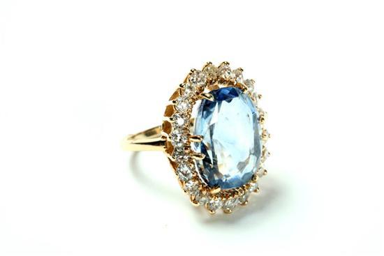 Appraisal: SAPPHIRE AND DIAMOND RING Ladies' cocktail ring with large blue