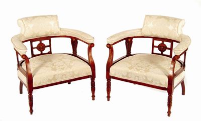 Appraisal: A pair of late Victorian rosewood and marquetry tub chairs