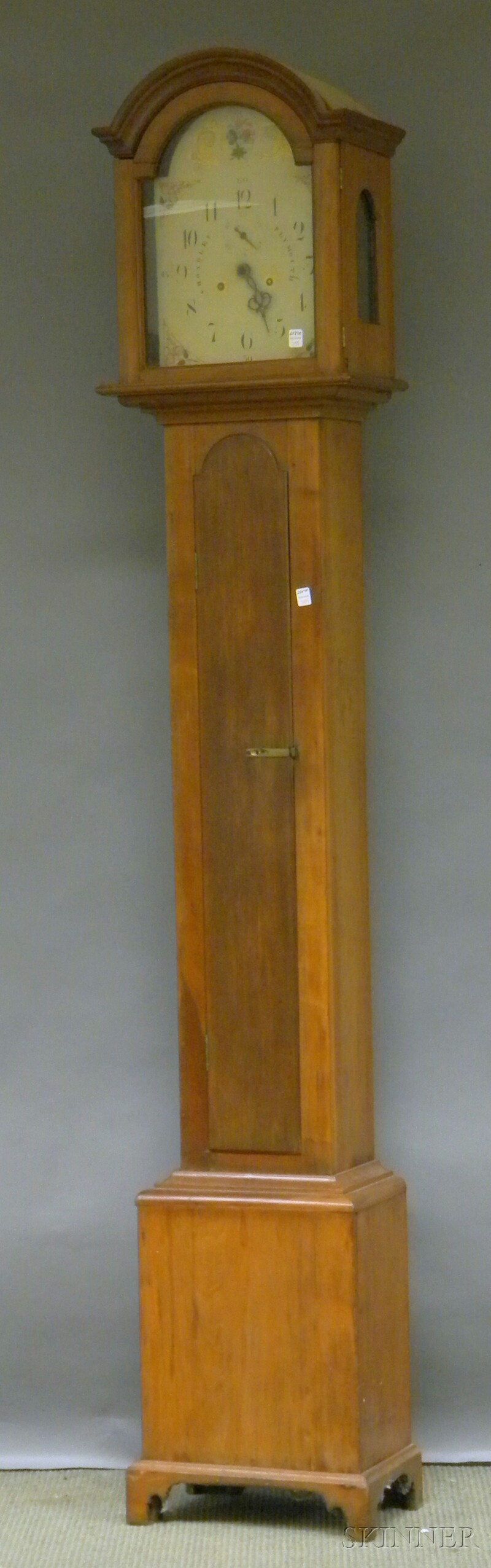 Appraisal: Silas Hoadley Cherry Tall Clock long slender tombstone waist door