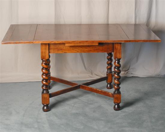 Appraisal: An E th C Oak Drawleaf Table the top and