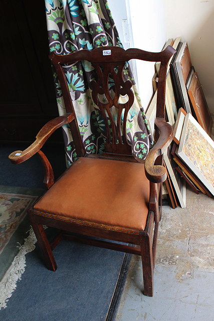 Appraisal: A PAIR OF TH CENTURY WALNUT DINING CHAIRS with pierced