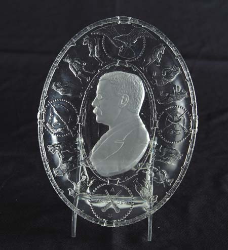 Appraisal: TEDDY ROOSEVELT PATTERN GLASS PLATTER Clear oval platter has a