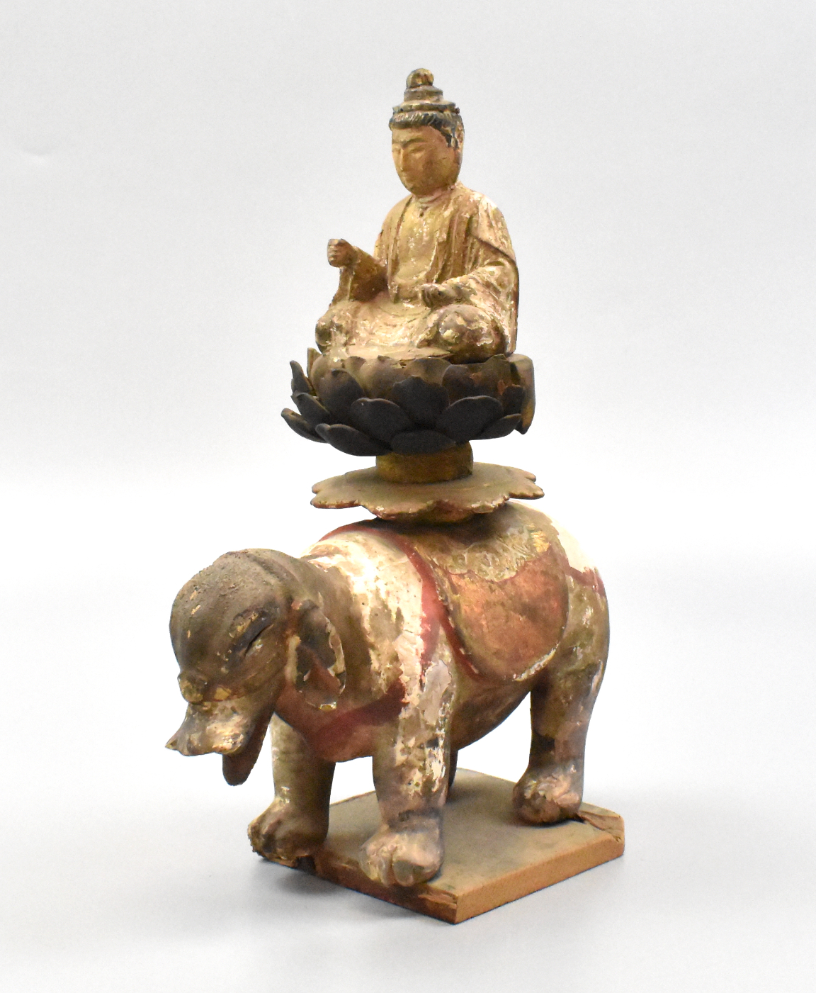 Appraisal: A Chinese wood Buddha figure on an elephant The seated