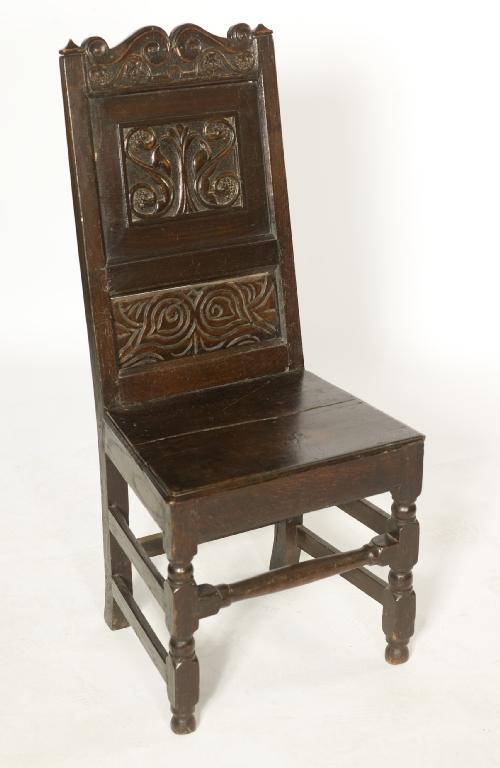 Appraisal: TWO th CENTURY OAK SIDE CHAIRS one with foliate carved