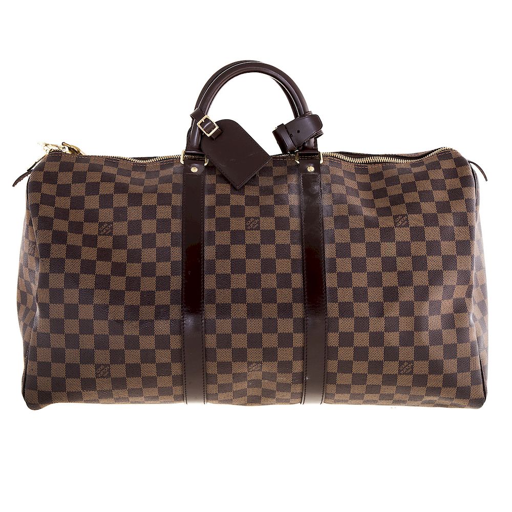 Appraisal: A Louis Vuitton Damier Ebene Keepall Brown Damier Ebene coated