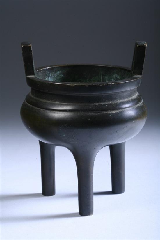 Appraisal: CHINESE BRONZE TRIPOD CENSER 'Jia cang zhen bao' four-character mark