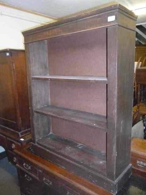 Appraisal: AN OLD DWARF FLOOR STANDING OPEN BOOKCASE with two shelves