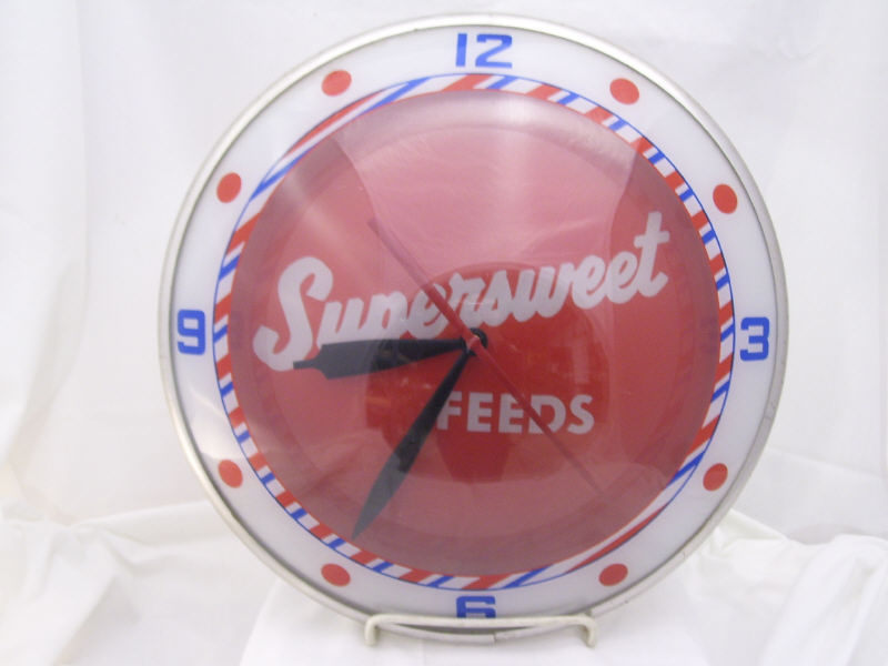 Appraisal: Supersweet Feeds Bubble Face Clock Bubble face clock Red face