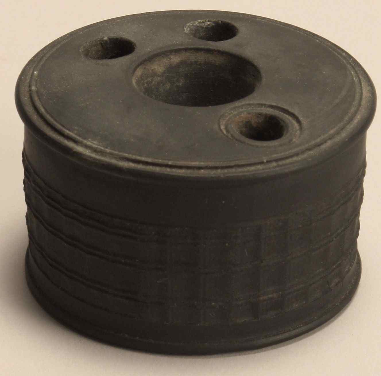 Appraisal: BLACK BASALT INKWELL th CenturyProbably Wedgwood Edge with incised concave