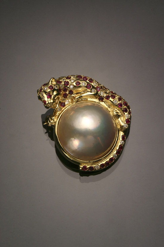 Appraisal: -Karat Yellow-Gold Mab Pearl Diamond Ruby and Pearl Panther Enhancer