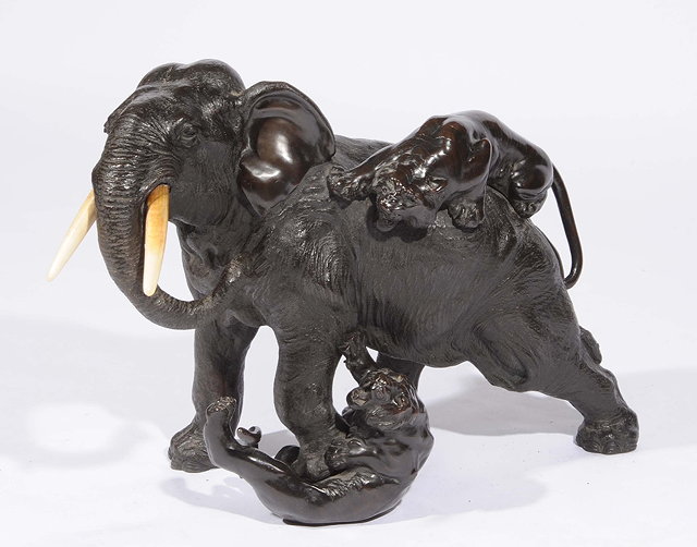 Appraisal: A bronze okimono of an elephantMeiji periodsigned Seiya with ivory