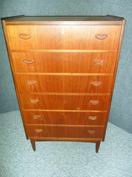 Appraisal: A DANISH TEAK CHEST OF DRAWERS of six long drawers