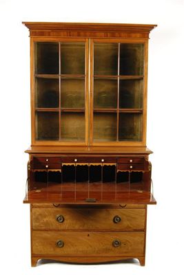 Appraisal: A mahogany secretaire bookcase the detachable cornice above a pair