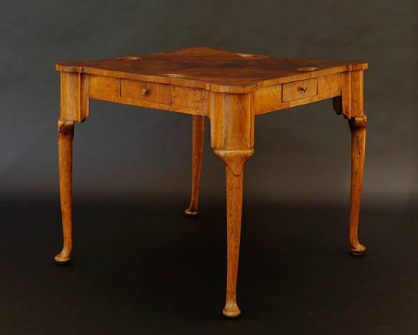 Appraisal: An Italian Rococo walnut games table The top with four