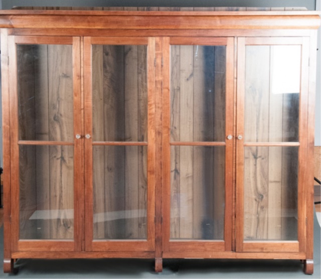 Appraisal: Ca Walnut Four Door Glass Book Case Terminates on scrolled