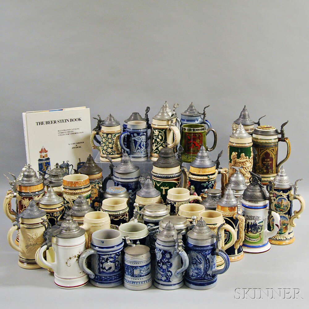 Appraisal: Forty-three German Ceramic and Stoneware Steins and Reference Book The