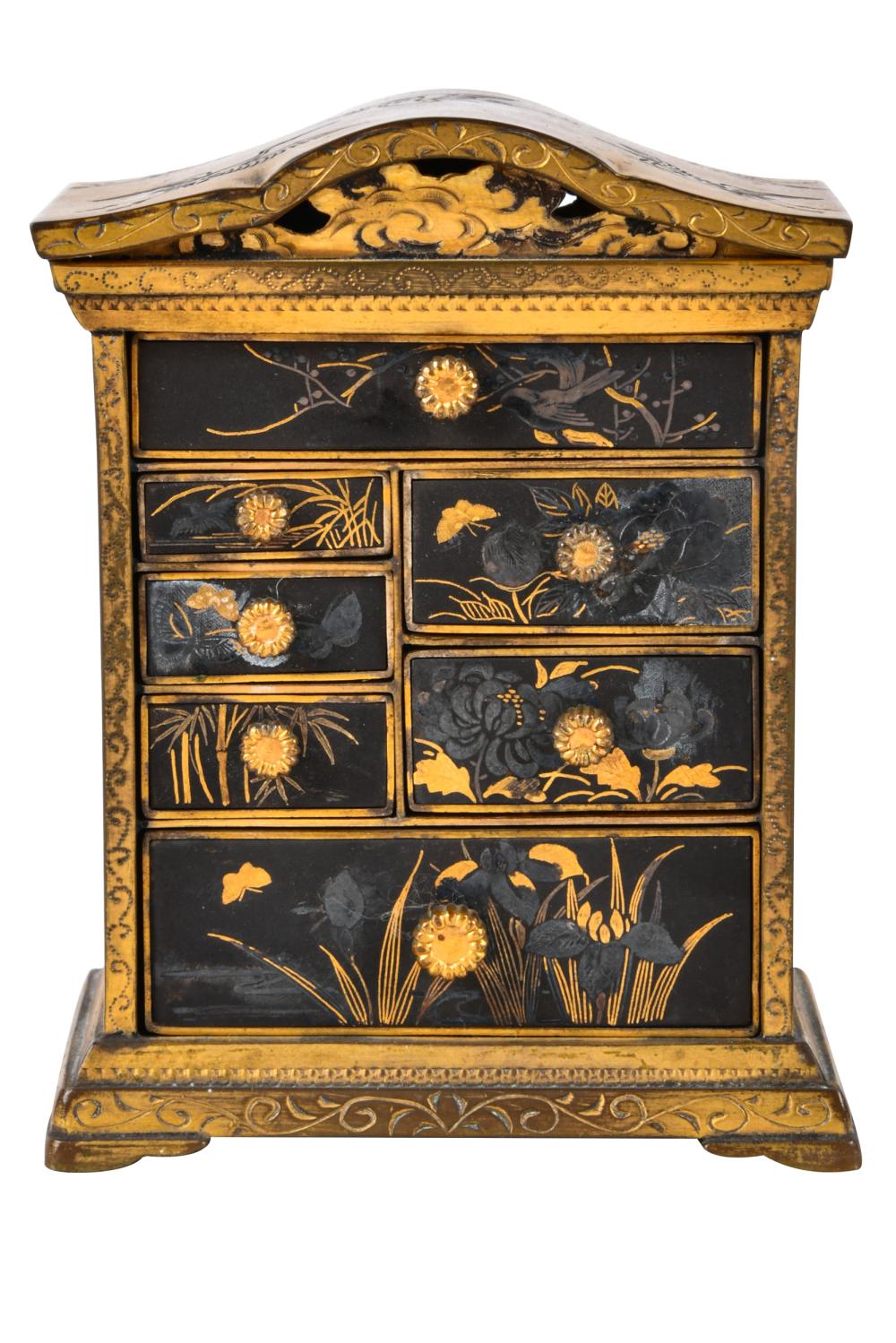 Appraisal: JAPANESE KOMAI LACQUERED MINIATURE CABINETunmarked the top decorated with flying