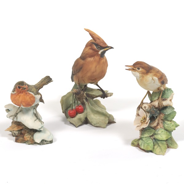 Appraisal: THREE GIUSEPPI TAGLIARIOL PORCELAIN BIRD FIGURINES BOHEMIAN WAX WING HOUSE