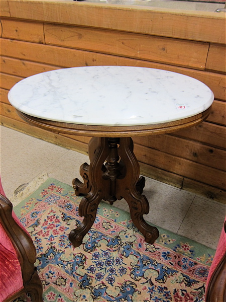 Appraisal: A VICTORIAN MARBLE-TOP WALNUT LAMP TABLE Rococo Revival design American