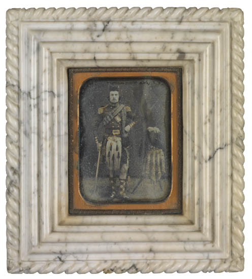 Appraisal: DAGUERREOTYPE Handsome half-plate daguerreian portrait of an armed Scotsman posing