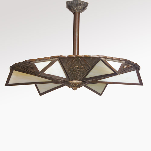 Appraisal: PAUL FOLLOT Attr Chandelier with embossed and faceted bronzed metal