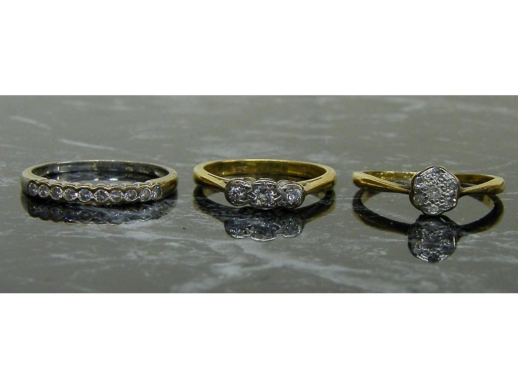 Appraisal: ct three stone diamond ring ct diamond half eternity ring