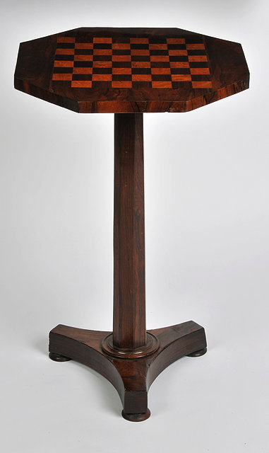 Appraisal: A TH CENTURY ROSEWOOD GAMES TABLE with octagonal top on