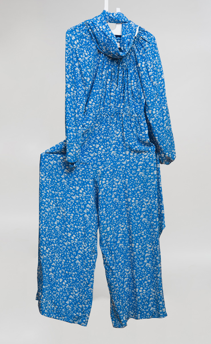 Appraisal: HALSTON BLUE AND WHITE FLORAL PATTERNED SILK JUMPSUIT WITH SASH