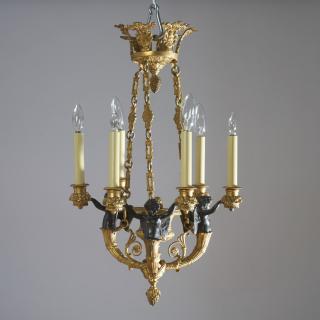 Appraisal: Napoleon III gilt bronze -arm chandelier th c ebonized winged