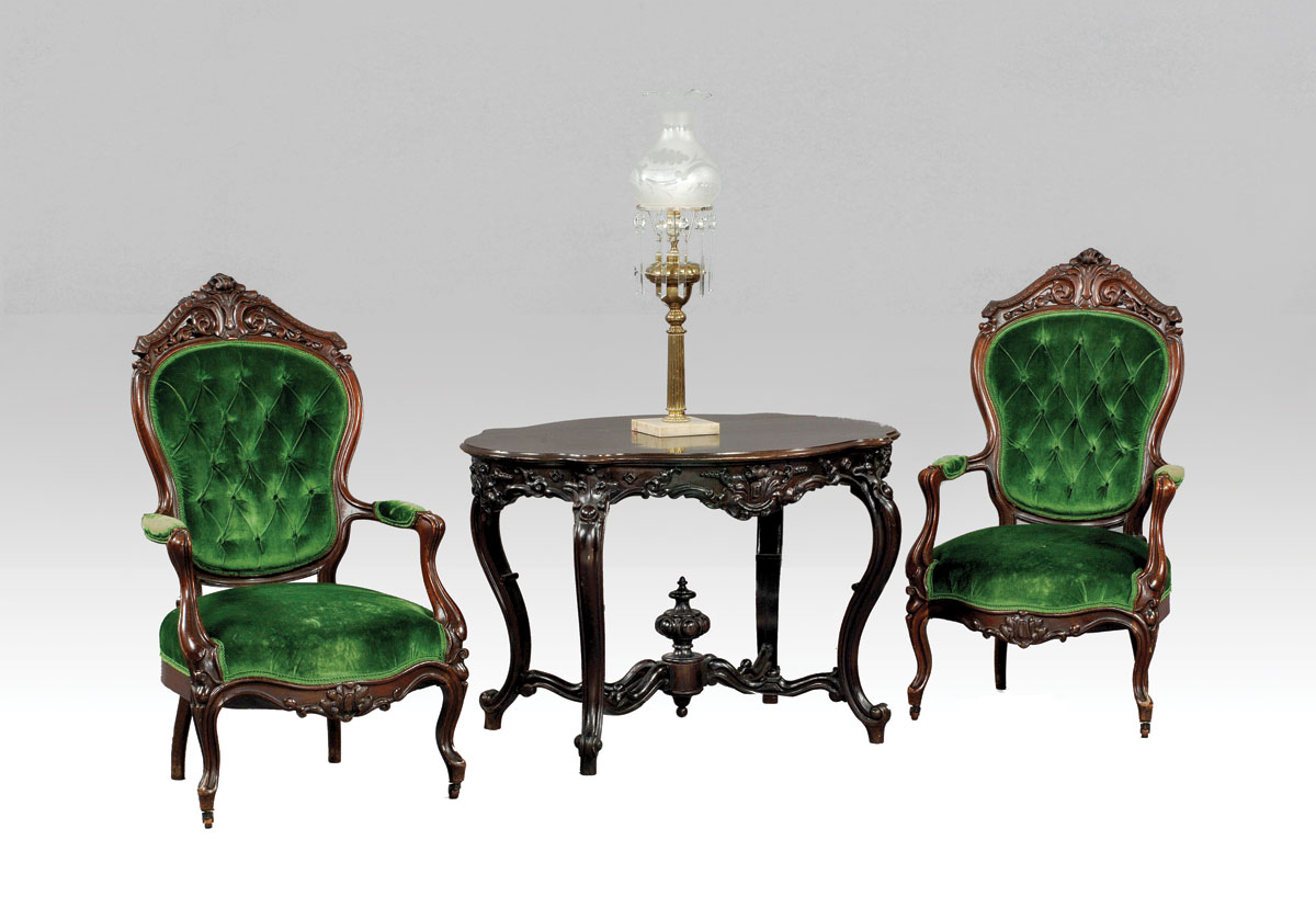 Appraisal: PAIR OF VICTORIAN CARVED ROSE WOOD AND UPHOLSTERED ARMCHAIRS Each