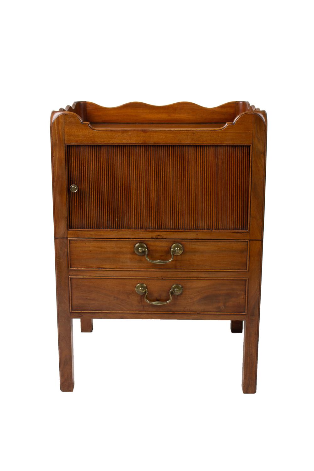 Appraisal: GEORGE III STYLE WALNUT BEDSIDE COMMODEwith tambour front and fixed