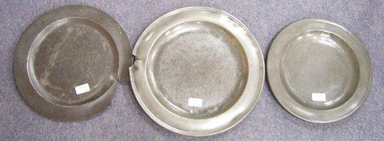 Appraisal: A pewter charger the reverse initialled I L cm diameter