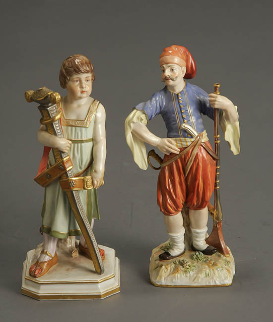 Appraisal: Two Meissen Figures of a Boy with a Sword and