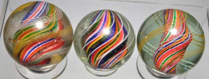 Appraisal: Lot of Divided Core Swirl Marbles Description All multicolored divided