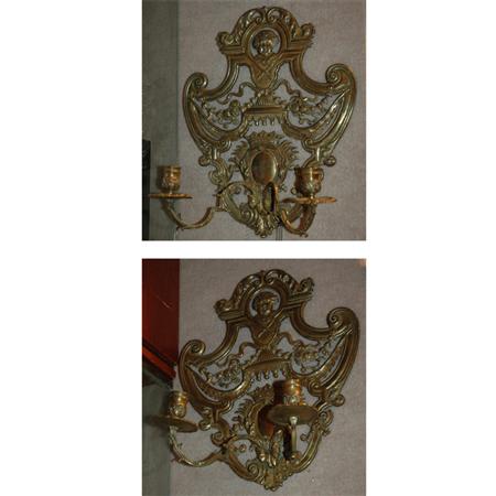 Appraisal: Pair of Regence Style Brass Two-Light Sconces Estimate -